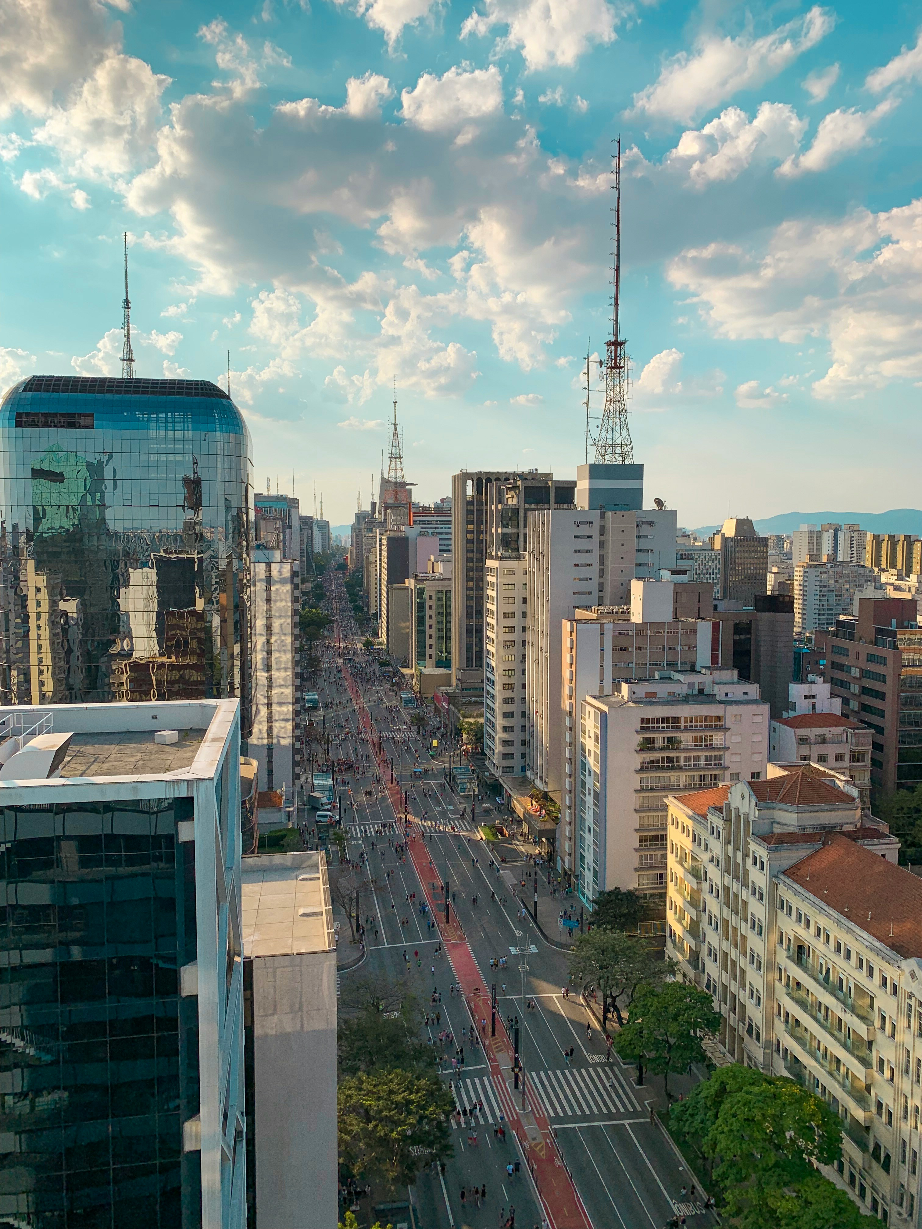 The Sao Paulo skyline down a busy street